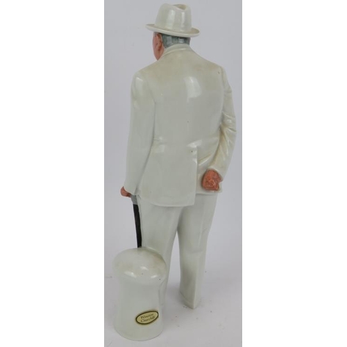 24 - A Royal Doulton figure of Sir Winston Churchill by Adrian Hughes, HN3057. Height 27cm.
Condition rep... 