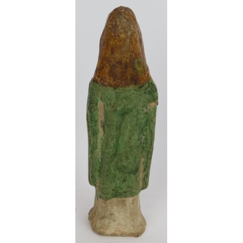 32 - A small Chinese Sancai funerary figure with green glaze cloak and amber glazed hood. Probably Tang D... 