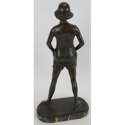 45 - An Art Deco style bronze figure of a young girl after Erich Van Den Driesch (1878-1915) mounted on a... 