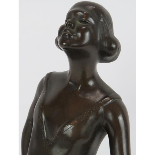 45 - An Art Deco style bronze figure of a young girl after Erich Van Den Driesch (1878-1915) mounted on a... 