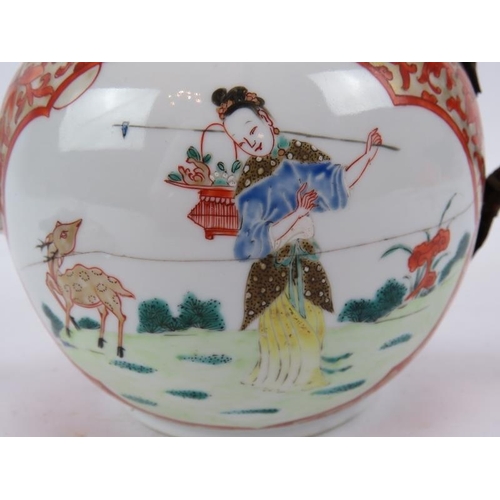 48 - An 18th century Chinese porcelain teapot decorated with gilt and iron red surrounding traditional sc... 