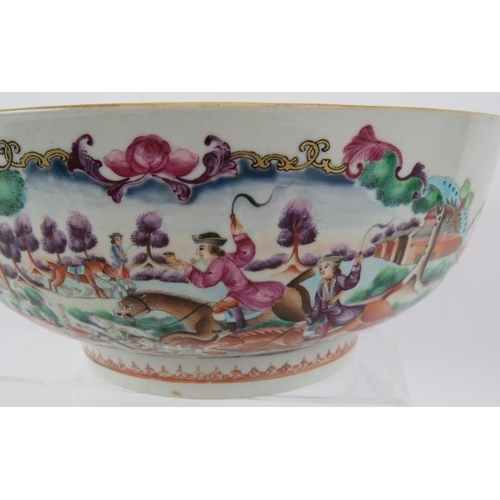 49 - A large 18th century Chinese porcelain bowl decorated in coloured enamels depicting European hunting... 