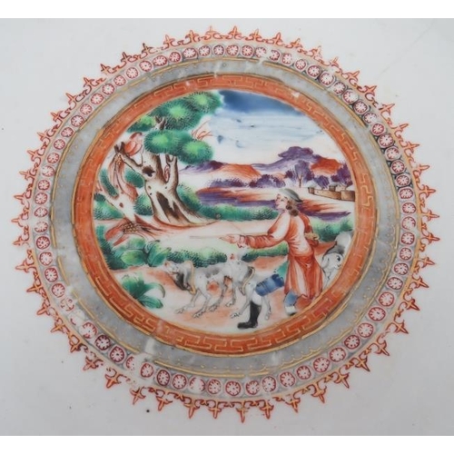 49 - A large 18th century Chinese porcelain bowl decorated in coloured enamels depicting European hunting... 