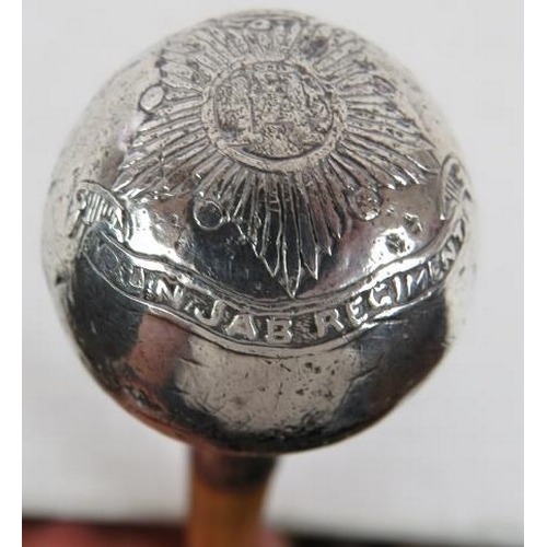 5 - A 14th Punjab Regiment swagger stick with white metal knob and Malacca cane shaft. Length: 75cm.
Con... 