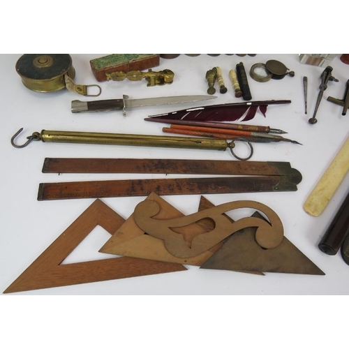 63 - A mixed lot of antique collectables including troy oz weights and scale, sovereign scales, rulers, w... 