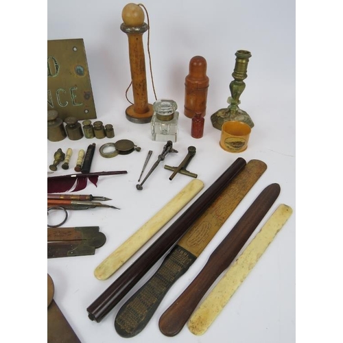 63 - A mixed lot of antique collectables including troy oz weights and scale, sovereign scales, rulers, w... 