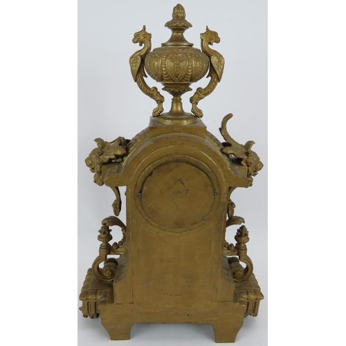 79 - A 19th Century Ormulu striking mantel clock with hand decorated porcelain dial and panels. Movement ... 