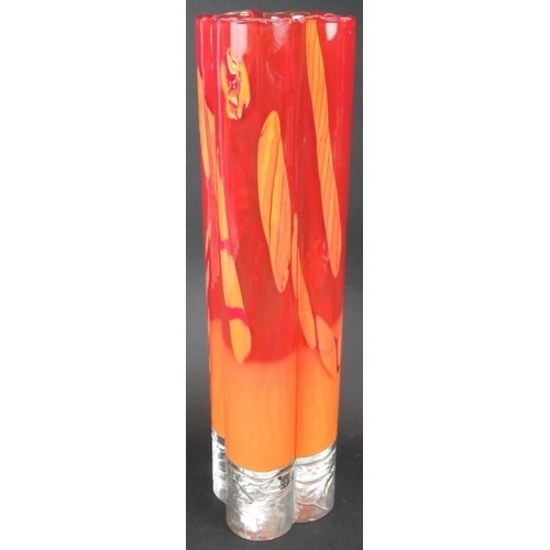 82 - A Mid-Century studio glass tall vase in orange hues, indistinct signature to base. Height: 35cm.
Con... 