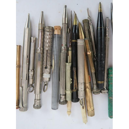 86 - A collection of mainly vintage and antique pencils, including four silver examples and two pen cigar... 