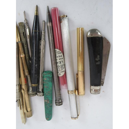 86 - A collection of mainly vintage and antique pencils, including four silver examples and two pen cigar... 