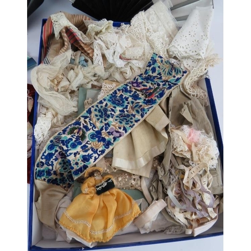 89 - A selection of antique lace and trimmings, three vintage fans and a selection of mainly bone handled... 