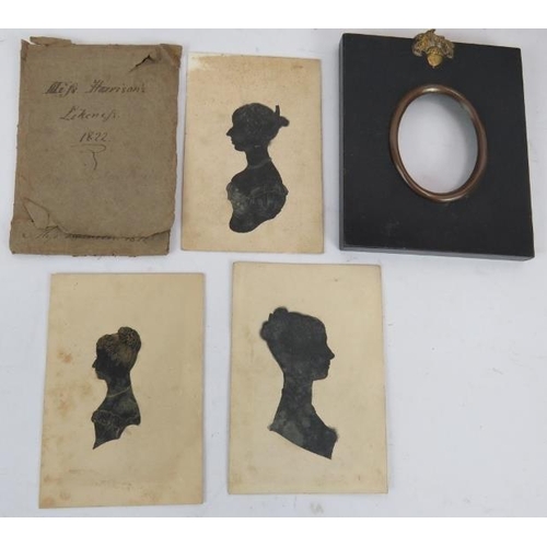 90 - Five 19th Century hand painted silhouette portraits.  Three labelled Miss Harrison 1822, unframed an... 