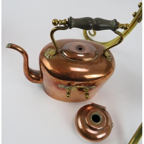 96 - A brass and copper Arts & Crafts spirit kettle on stand, height 98cm, and a small brass spirit kettl... 