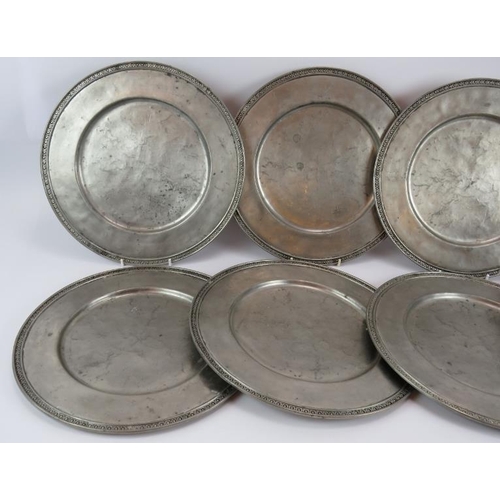 97 - A set of eight large French pewter platters in traditional style, each marked GT Etain. Diameter 33c... 