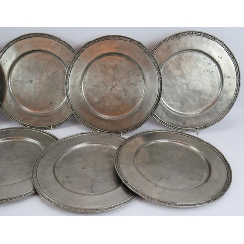 97 - A set of eight large French pewter platters in traditional style, each marked GT Etain. Diameter 33c... 