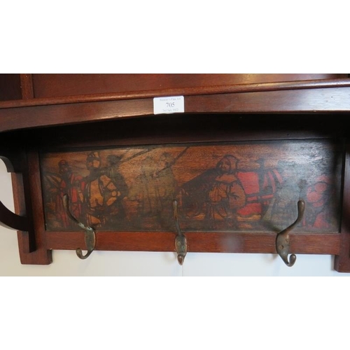 705 - An Arts & Crafts mahogany wall hanging bookshelf with painted frieze under depicting a medieval scen... 