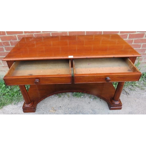 711 - A Victorian mahogany console table/writing desk with two cock-beaded short drawers, on four tapering... 