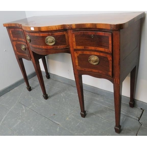 714 - A George III mahogany serpentine front sideboard, inlaid and crossbanded, with central long drawer a... 