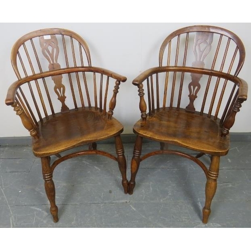 715 - A pair of Georgian elm and yew wood hoop back Windsor chairs of excellent colour, with shaped and pi... 