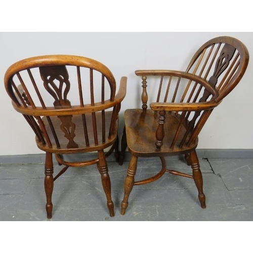 715 - A pair of Georgian elm and yew wood hoop back Windsor chairs of excellent colour, with shaped and pi... 