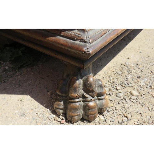 717 - An 18th century Italian fruitwood cassone, with fielded front panels, on lion’s paw feet. 
Condition... 