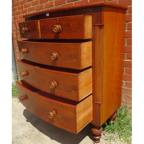 720 - An early Victorian mahogany chest of two short over three long graduated drawers with original turne... 