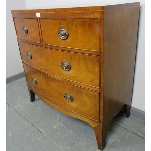 723 - A Regency Period bow fronted mahogany chest of two short over two long graduated cock-beaded drawers... 