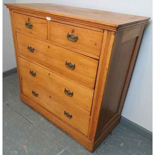 724 - An Edwardian satin walnut chest of two short over three long graduated drawers, with pressed brass h... 