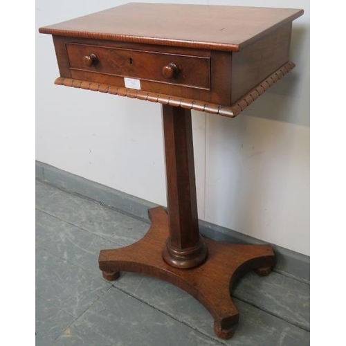 725 - A Victorian mahogany work table with cock-beaded single drawer, on a tapering octagonal pedestal and... 