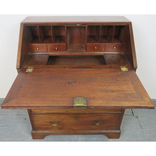 729 - An 18th century mahogany bureau, the fall front opening onto a fitted interior with document safe an... 