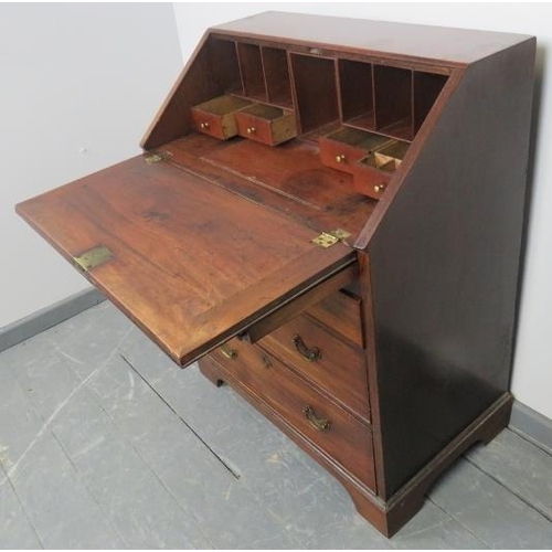 729 - An 18th century mahogany bureau, the fall front opening onto a fitted interior with document safe an... 