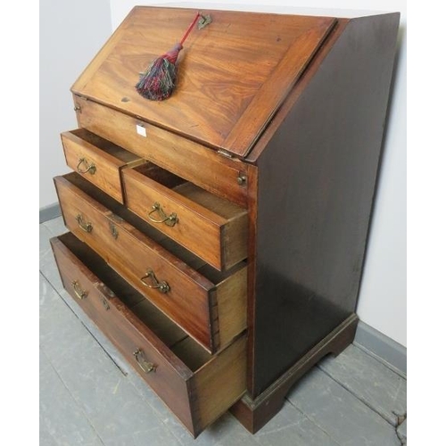 729 - An 18th century mahogany bureau, the fall front opening onto a fitted interior with document safe an... 