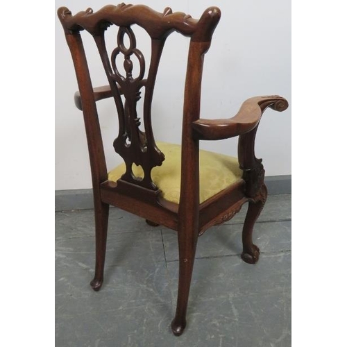 734 - A vintage mahogany child’s chair in the Chippendale taste, with acanthus carving, on claw & ball fee... 