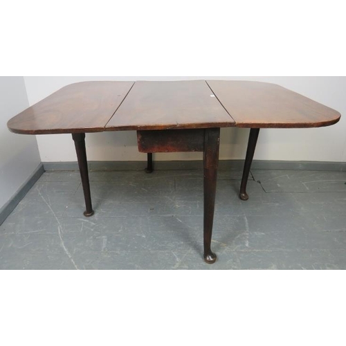 741 - A Georgian mahogany drop leaf cottage dining table, on tapering supports with pad feet. 
Condition r... 