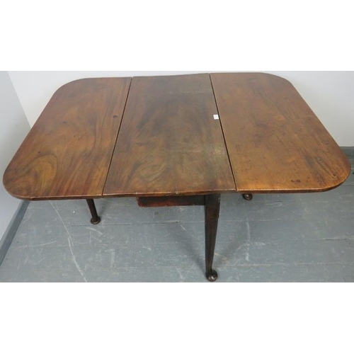 741 - A Georgian mahogany drop leaf cottage dining table, on tapering supports with pad feet. 
Condition r... 