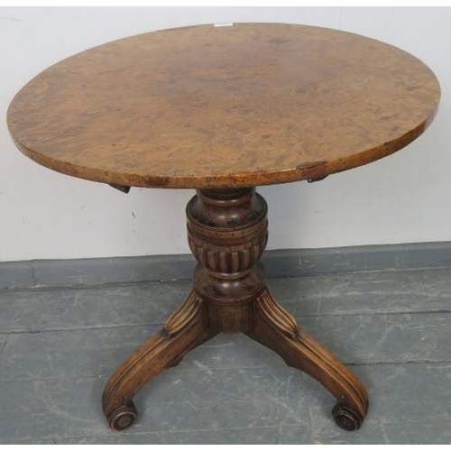 742 - A  fine early 19th century circular tilt top table with solid burr walnut top, on a mahogany tripod ... 