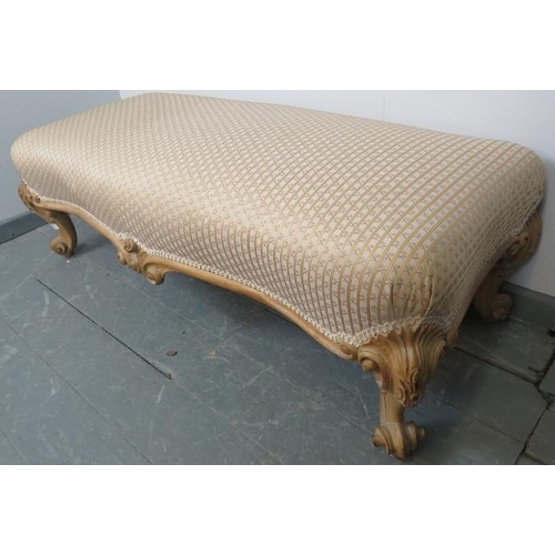 750 - An antique beech shaped front low stool in the French taste, upholstered in gold and cream striped m... 