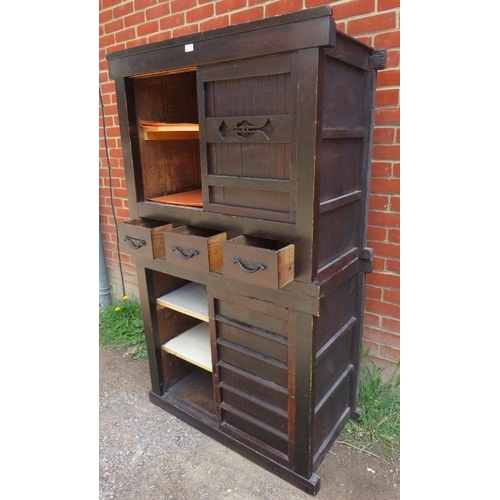 756 - An antique Japanese ebonised two section Mizuya Tansu (kitchen chest) housing three short drawers wi... 