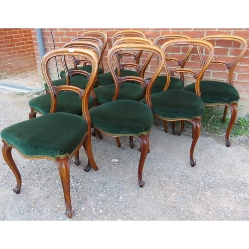 758 - A set of ten Victorian walnut balloon back dining chairs, with acanthus carved backrests, upholstere... 