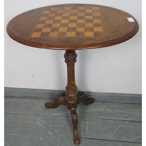 759 - A 19th century burr walnut oval drop-leaf chess table, with parquetry inlaid chessboard in rosewood ... 