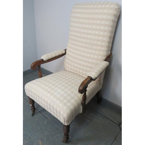 766 - An early Victorian rosewood open-sided high back armchair, upholstered in a cream checked material, ... 