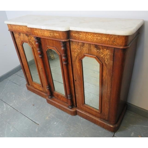 769 - A 19th century breakfront walnut credenza, with white marble top and marquetry inlaid frieze, the do... 