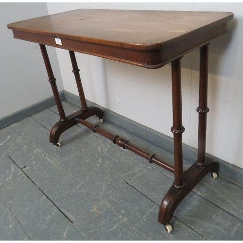 791 - A Victorian walnut console table, on faux bamboo supports with a turned stretcher, raised on ceramic... 