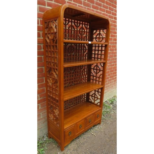 794 - A contemporary Chinese hardwood open bookcase of four shelves, with open fretwork to sides and back ... 