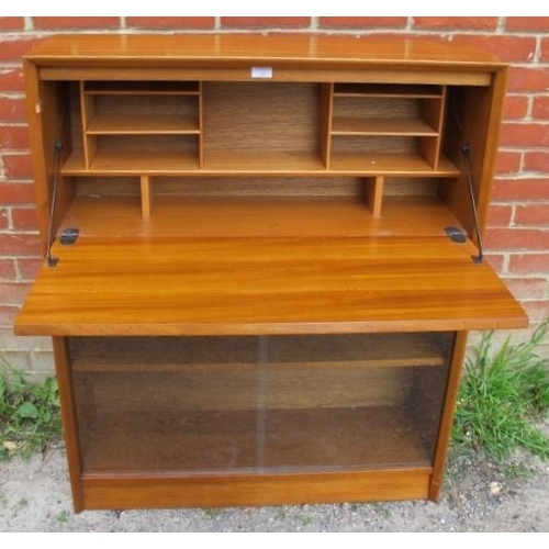 805 - A mid-century teak bureau bookcase by Herbert E Gibbs, the fall front bureau section with fitted int... 