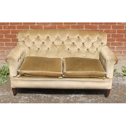 807 - An Edwardian mahogany button backed two-seater sofa, upholstered in beige draylon with rope braiding... 