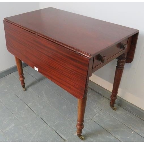 822 - An early Victorian mahogany Pembroke table, with single drawer and dummy drawer, on tapering turned ... 