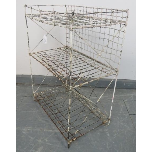 827 - A 19th century wirework two-tier plant stand, together with a vintage galvanized bucket/planter.
Con... 