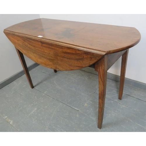 828 - A Georgian mahogany oval Pembroke table, the single drawer with brass lock escutcheon and swan neck ... 