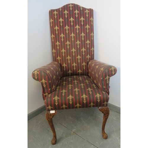 830 - A Georgian Revival highback armchair, upholstered in a claret striped material embroidered with fleu... 